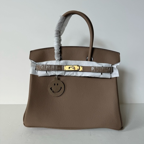 None Handbags - Etoupe Pebble Leather 30 Leather Bag Belted Lock Key Satchel w/ Gold Hardware C1